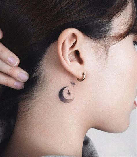 moon tattoo behind ear